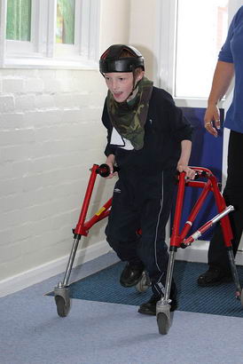 Boy with walking support