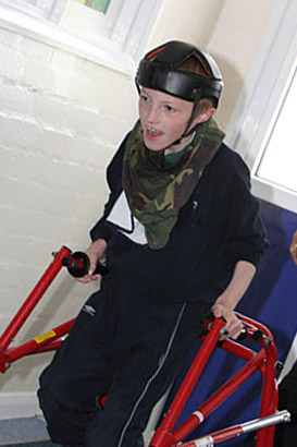Boy with walking support