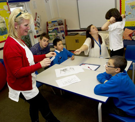 Teacher interacting with a girl