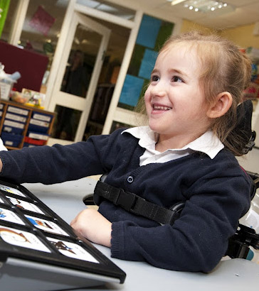 Girl using the Tech/Talk device