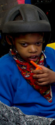 Pupil eating a carrot stick