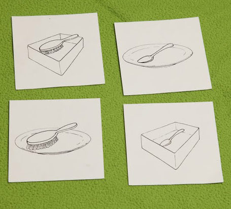 Four line drawings of a brush, a spoon,
                  a box and a plate in various relative positions