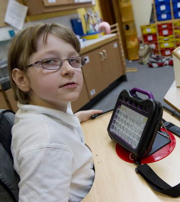 A girl using assistive technology