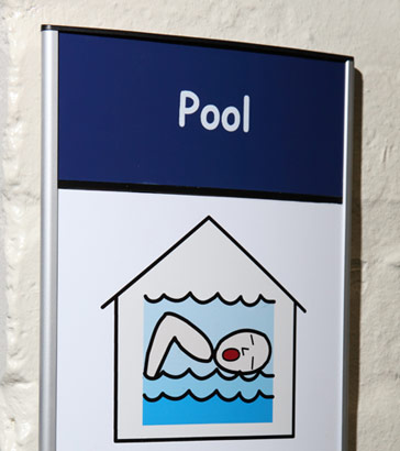 A swimming pool sign: featuring a sketch
                  of a person swimming in water