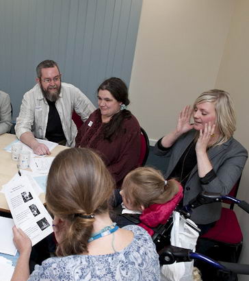 A large multidisciplinary team
                  meets with the child in their care