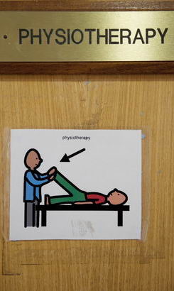 A physiotherapy door sign
