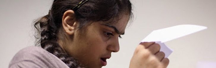 Girl looking at a paper