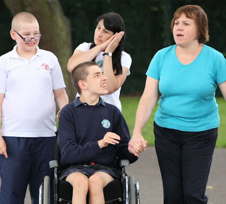 Outside activity with disabled children.