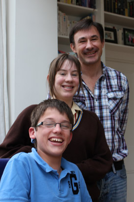 A father, daughter and son at home together