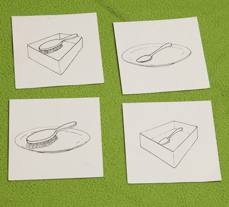 Four line drawings of a brush, a spoon, a box and a plate in various relative positions
