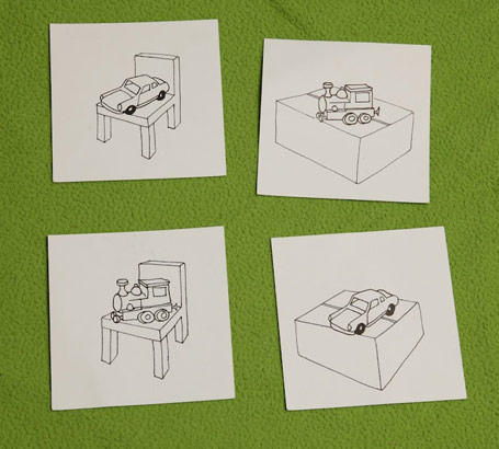 Four line drawings of a car, a train, a box and a chair in various relative positions