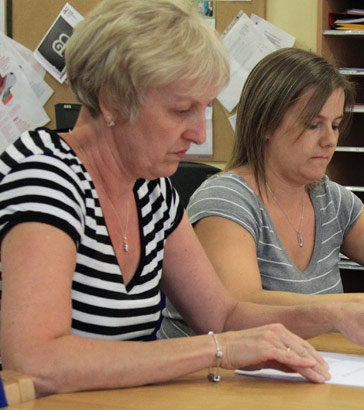Three teachers in a meeting